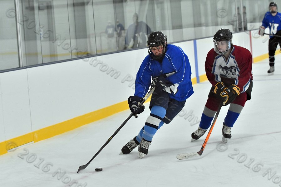 Wheaton College Men\'s Ice Hockey vs Middlesex Community College. - Photo By: KEITH NORDSTROM
